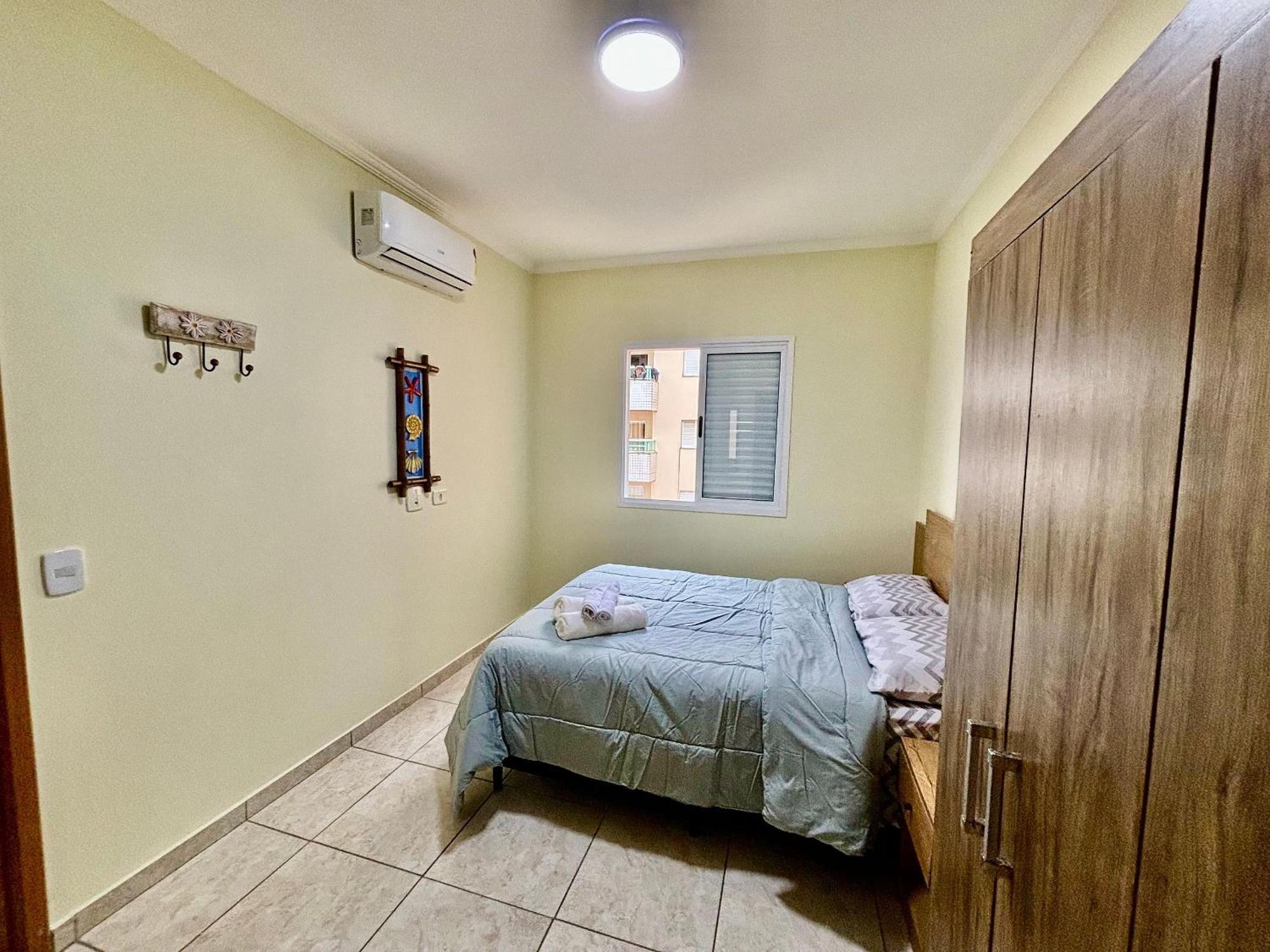 Casa de férias Apto Toninhas C/ar Condicionado E Piscina *